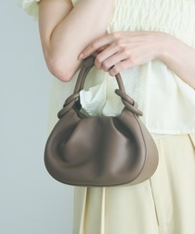 Olu.（オルドット）の「ラウンドコンパクトハンドバッグ（ハンドバッグ）」