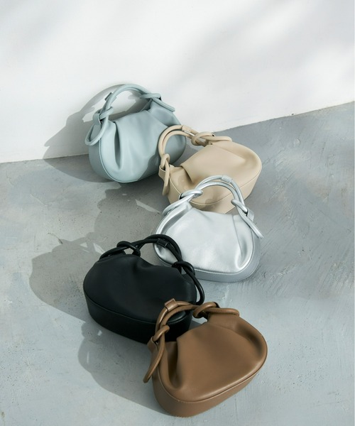 Olu.(オルドット)の「ラウンドコンパクトハンドバッグ(ハンドバッグ・レディース・アイボリー/ブラック/グレイッシュベージュ/シルバー/ブルー系その他・FREE)」の6枚目の写真