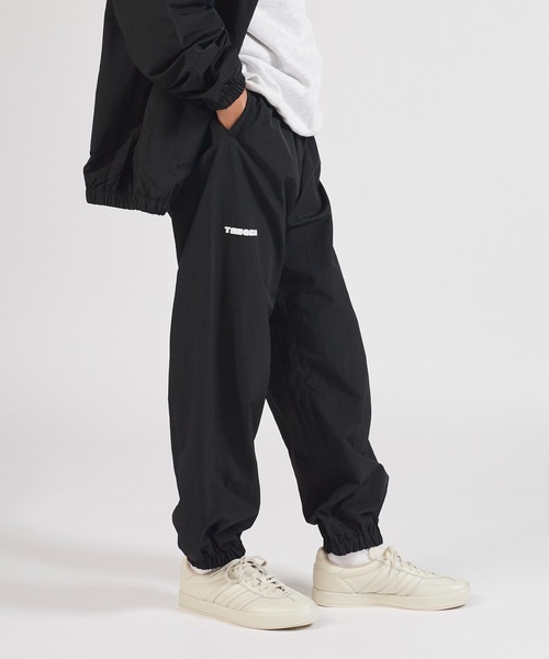 TANGRAM(タングラム)の「ZOZOTOWN限定 PUZZLE LOGO NYLON TRAINING PANTS(その他パンツ・メンズ・ブラック/ダークグレー・M/L/XL)」の6枚目の写真