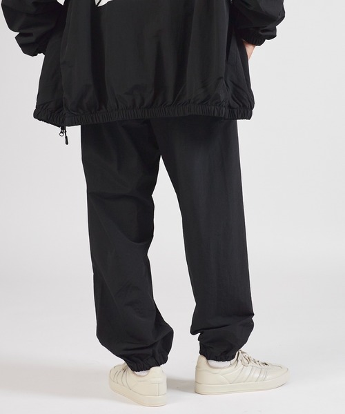 TANGRAM(タングラム)の「ZOZOTOWN限定 PUZZLE LOGO NYLON TRAINING PANTS(その他パンツ・メンズ・ブラック/ダークグレー・M/L/XL)」の8枚目の写真