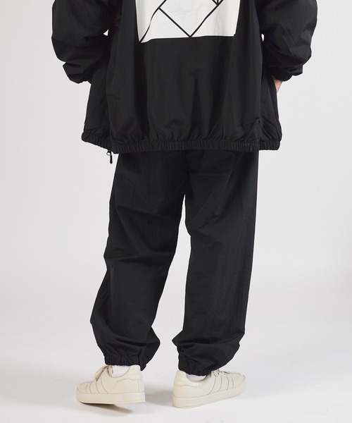TANGRAM(タングラム)の「ZOZOTOWN限定 PUZZLE LOGO NYLON TRAINING PANTS(その他パンツ・メンズ・ブラック/ダークグレー・M/L/XL)」の9枚目の写真