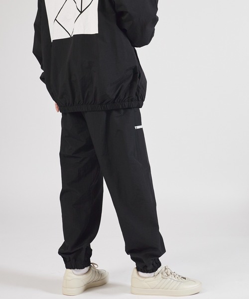 TANGRAM(タングラム)の「ZOZOTOWN限定 PUZZLE LOGO NYLON TRAINING PANTS(その他パンツ・メンズ・ブラック/ダークグレー・M/L/XL)」の10枚目の写真