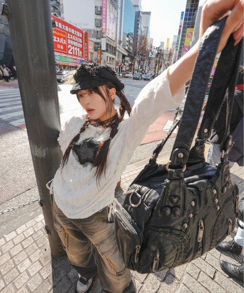XU（エックスユー）の「【Never mind the XU】star damage tops