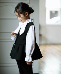 BeBe（ベベ）の「ダブルクロスパールボタンペプラムベスト(110~130cm)（ベスト・キッズ）」