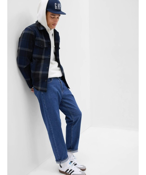 GAP（ギャップ）の「Gapflex ウォッシュウェル(TM) リラックステーパードデニム（デニムパンツ・メンズ・ライトインディゴブルー・31W 30L/29W 30L/30W 30L/32W 30L/28W 30L/32W 32L/31W 32L/36W 32L/33W 32L/34W 32L）」の16枚目の写真