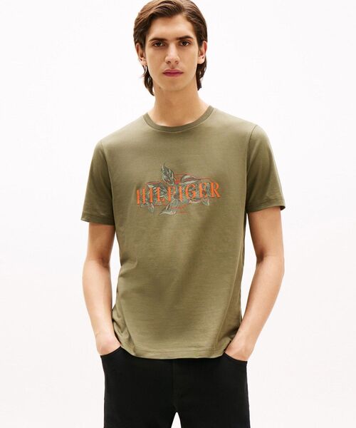 TOMMY HILFIGER(トミーヒルフィガー)の「トロピカルフローラルヒルフィガーTシャツ(Tシャツ/カットソー・メンズ・ホワイト/カーキ・SMALL/LARGE/MEDIUM/X-LARGE)」の1枚目の写真