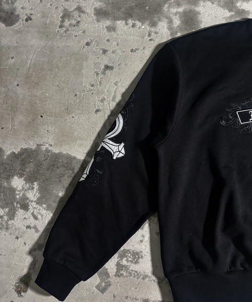 A'GEM/9 × .kom 『A'GEM/9/エージェムナイン』クロスロゴトレーナー A