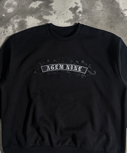 A'GEM/9 × .kom 『A'GEM/9/エージェムナイン』クロスロゴトレーナー A