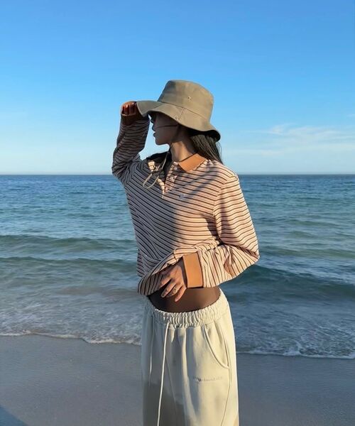 PARTIMENTO WOMEN（パルティメントウィメン）の「ストライプロングスリーブポロTシャツ_サーモン（ポロシャツ・レディース・その他・OS）」の7枚目の写真