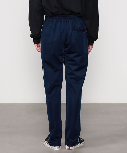 adidas（アディダス）の「adidas | トラックパンツ NAVY MEN