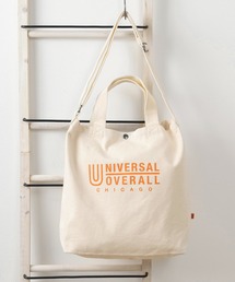 UNIVERSAL OVERALL（ユニバーサルオーバーオール）の「【94】【UNIVERSAL OVERALL/ユニバーサルオーバーオール】ブランドロゴプリント＆ピスネームタグデザイン 2WAY スーベニアキャンバストート/ ショルダーバッグ/15L（ショルダーバッグ・レディース）」