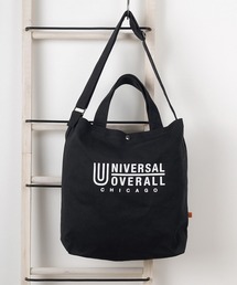 UNIVERSAL OVERALL（ユニバーサルオーバーオール）の「【94】【UNIVERSAL OVERALL/ユニバーサルオーバーオール】ブランドロゴプリント＆ピスネームタグデザイン 2WAY スーベニアキャンバストート/ ショルダーバッグ/15L（ショルダーバッグ）」