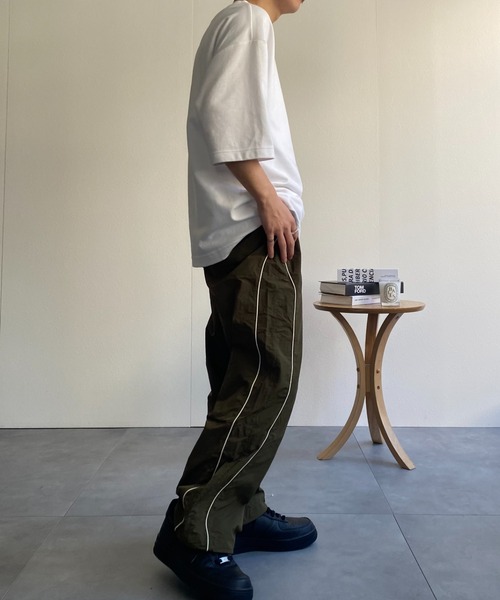CREARE -LINO-（クレアーレリノ）の「パイピング ナイロン ルーズ パンツ<ユニセックス>（その他パンツ・メンズ・ブラック/カーキ/グレー・M/L）」の17枚目の写真
