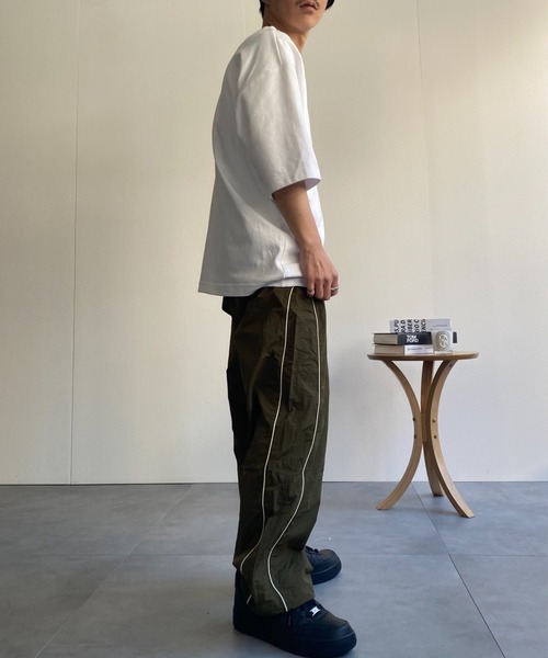 CREARE -LINO-（クレアーレリノ）の「パイピング ナイロン ルーズ パンツ<ユニセックス>（その他パンツ・メンズ・ブラック/カーキ/グレー・M/L）」の22枚目の写真