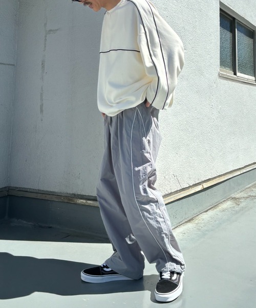 CREARE -LINO-（クレアーレリノ）の「パイピング ナイロン ルーズ パンツ<ユニセックス>（その他パンツ・メンズ・ブラック/カーキ/グレー・M/L）」の7枚目の写真