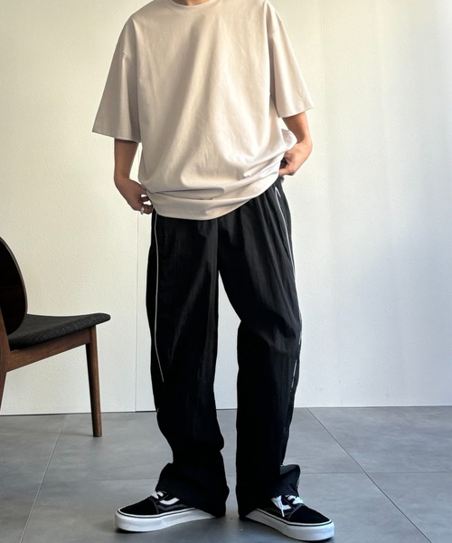 CREARE -LINO-（クレアーレリノ）の「パイピング ナイロン ルーズ パンツ<ユニセックス>（その他パンツ・メンズ・ブラック/カーキ/グレー・M/L）」の16枚目の写真