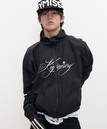 KEYMISERY（キーミザリー）の「A'GEM/9 × .kom 『KEYMISERY/キーミザリー』 BLAST KEYMISERY WINDBREAKER/ブラストキーミザリー短丈ウィンドブレーカー（ブルゾン）」