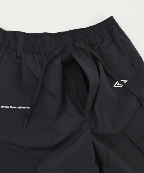 WHITE MOUNTAINEERING（ホワイトマウンテニアリング）の「WM x UMBRO（ホワイトマウンテニアリング＊アンブロ）EASY CARGO PANTS（カーゴパンツ・メンズ・ブラック・3/2）」の6枚目の写真