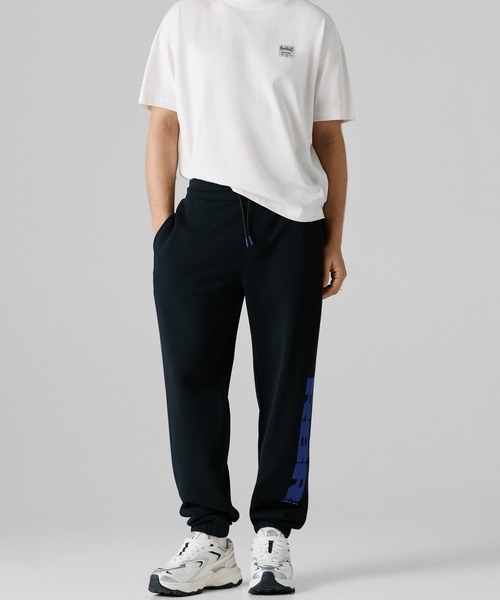 Red Bull Racing(レッドブルレーシング)の「RACING×PEPEJEANS SWEAT PANTS(スウェットパンツ・メンズ・ブラック×ブルー・X-LARGE/LARGE/MEDIUM/SMALL)」の2枚目の写真