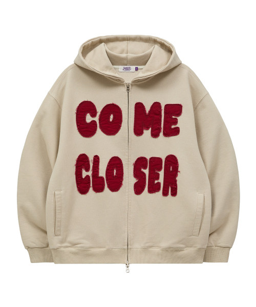 HOODHOOD(フッドフッド)の「COME CLOSER アプリケ フードパーカー ベージュ(パーカー・レディース・その他・1/2)」の5枚目の写真