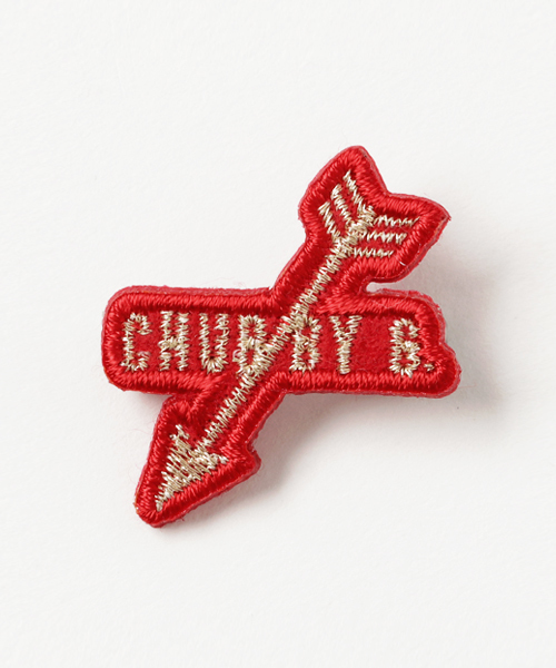 CHUBBYGANG（チャビーギャング）の「矢モチーフロゴブローチ（その他小物・キッズ・ブラック/レッド・FREE）」の2枚目の写真