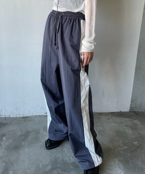 AIC.（エーアイシー）の「サイドラインナイロンパンツ（その他パンツ