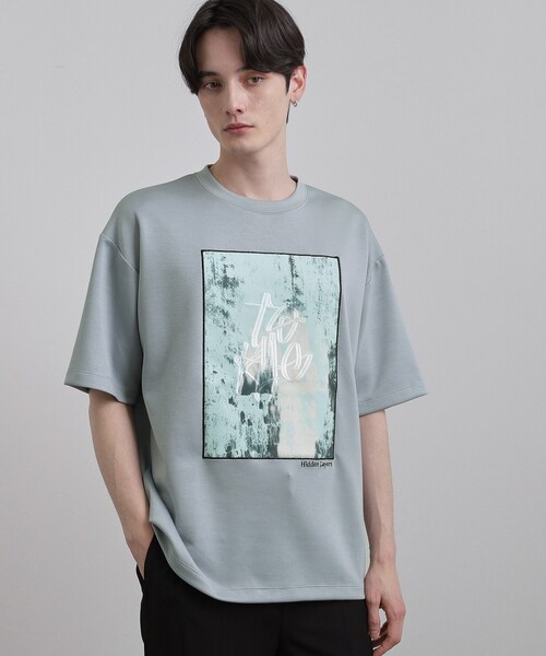 tk.TAKEO KIKUCHI(ティーケータケオキクチ)の「コンシールドエンブロTシャツ(Tシャツ/カットソー・メンズ・ホワイト/ブラック/ライトブルー・02/03)」の1枚目の写真