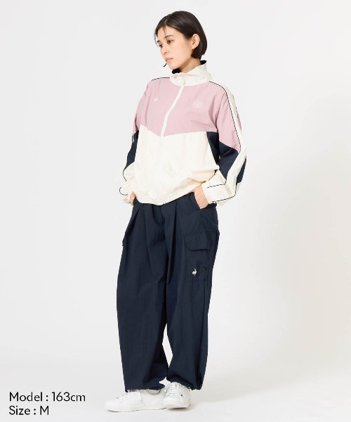 le coq sportif(ルコックスポルティフ)の「【はっ水】ナイロンワッシャーフルジップウィンドジャケット(ナイロンジャケット・レディース・ホワイト/グリーン・L/M/S/XL)」の4枚目の写真