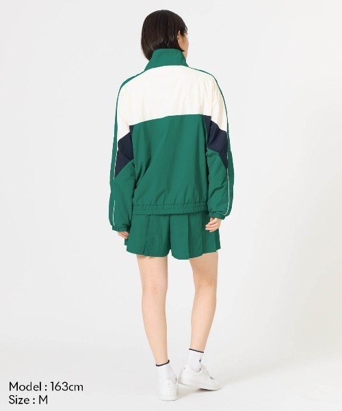 le coq sportif(ルコックスポルティフ)の「【はっ水】ナイロンワッシャーフルジップウィンドジャケット(ナイロンジャケット・レディース・ホワイト/グリーン・L/M/S/XL)」の10枚目の写真