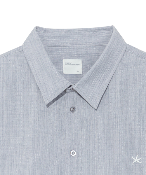 THECOLDESTMOMENT(ザコールデストモーメント)の「TCM mini logo textured half shirt (blue grey)(シャツ/ブラウス・レディース・その他・LARGE/MEDIUM)」の4枚目の写真