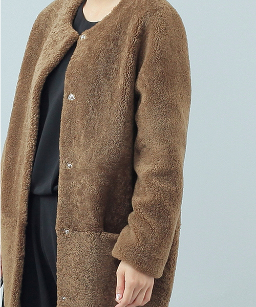 ELFORBR（エルフォーブル）の「オーストラリアムートンコクーンコート（ムートンコート・レディース・ネイビー/キャメル・38）」の9枚目の写真