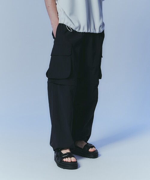 tk.TAKEO KIKUCHI(ティーケータケオキクチ)の「◆デタッチャブルワイドパンツ(その他パンツ・メンズ・グレー/ブラック・02/03)」の1枚目の写真
