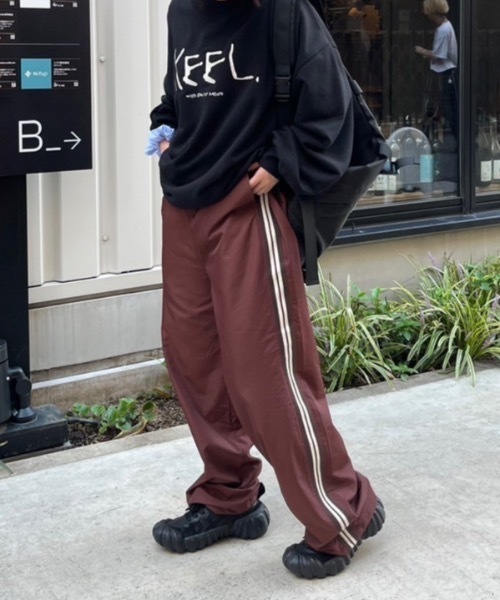 nemne store（ネンネストア）の「【keel】ラインナイロンパンツ（その他パンツ・レディース・ネイビー/ブラウン・SMALL/MEDIUM）」の2枚目の写真