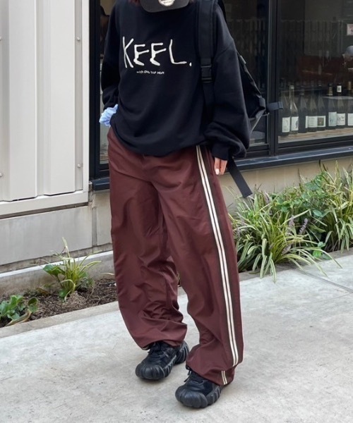 nemne store（ネンネストア）の「【keel】ラインナイロンパンツ（その他パンツ・レディース・ネイビー/ブラウン・SMALL/MEDIUM）」の7枚目の写真