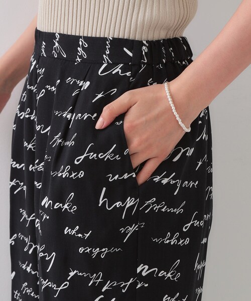 OPAQUE.CLIP（オペークドットクリップ）の「レタープリントイージーワイドパンツ【洗濯機洗い可】（その他パンツ・レディース・ブラック系/オリーブ系・40/38/42）」の4枚目の写真
