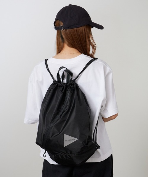 and wander/アンドワンダー crispy rip drawstring bag ナップサック