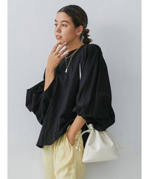 Ungrid（アングリッド）の「フェイクレザー巾着BAG（ハンドバッグ・レディース・ブラック/アイボリー・FREE）」の7枚目の写真