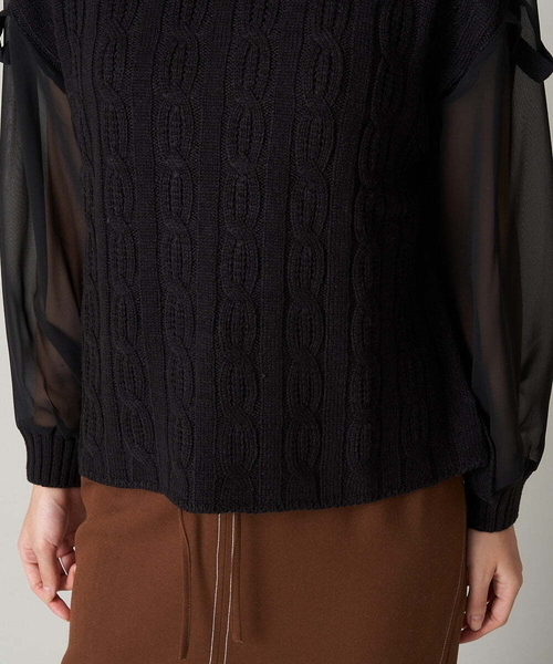 A de a.v.v（アードアー・ヴェ・ヴェ）の「袖レイヤード風ドッキングニット（ニット/セーター・レディース・ブラック/ブルー・38/36）」の7枚目の写真