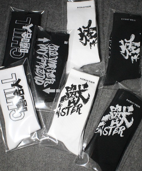 .KOM(ドットコム)の「『.KOM/ドットケーオーエム』ハードデザインソックス(ソックス/靴下・メンズ・ブラック/ホワイト・FREE)」の4枚目の写真