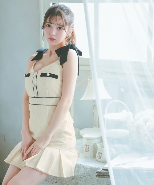Tika(ティカ)の「キャバドレス ミニ フレア キャミソール ノースリーブ リボン パイピング パールボタン ボックスプリーツドレス(ドレス・レディース・ブルー/アイボリー・L/M/S/XL/XS)」の13枚目の写真