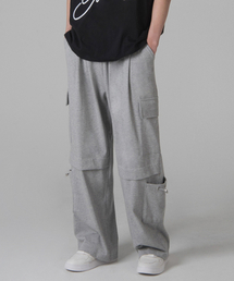 UNLC（ユーエヌエルシー）の「wide cargo string pocket pants melange gray（スウェットパンツ）」