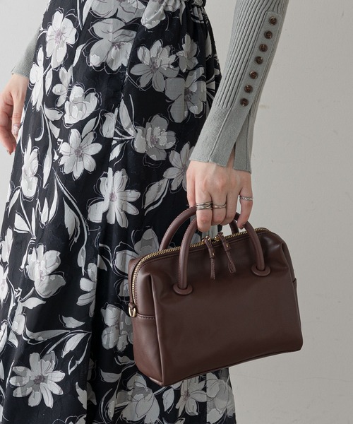 natural couture（ナチュラルクチュール）の「くるみハトメミニボストンバッグ（ボストンバッグ・レディース・ブラック/ブラウン/イエロー・FREE）」の2枚目の写真