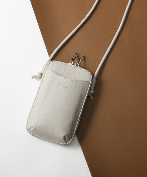 tk.TAKEO KIKUCHI（ティーケータケオキクチ）の「◆縦型スマホポーチ（ショルダーバッグ・メンズ・ブラック/ベージュ系/ブラック系/オレンジ/グリーン系その他2/ブラウン系4/ブラック系3・00）」の5枚目の写真