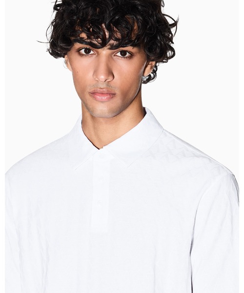 ARMANI EXCHANGE(アルマーニエクスチェンジ)の「【A|X アルマーニ エクスチェンジ】オールオーバージャカードロゴ 半袖ポロシャツ/REGULAR(ポロシャツ・メンズ・ブラック/ホワイト・LARGE/X-LARGE/X-SMALL/SMALL/MEDIUM)」の4枚目の写真