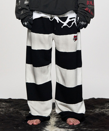 SCHISM INDUCING（スキズムインデューシング）の「STEAL HEART PANTS BLACK（スウェットパンツ）」