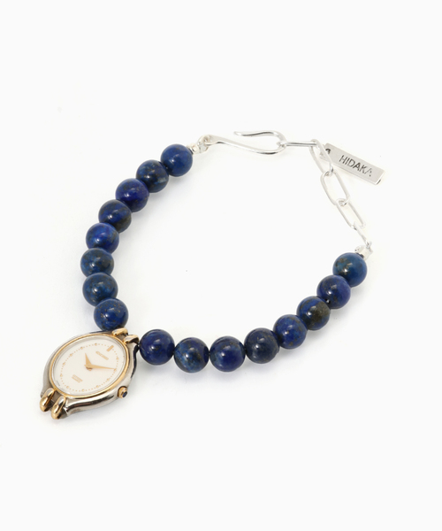 HIDAKA(ヒダカ)の「HIDAKA / ヒダカ ORBIT WATCH BRACELET LAPIS(ブレスレット・メンズ・ネイビー・FREE)」の1枚目の写真