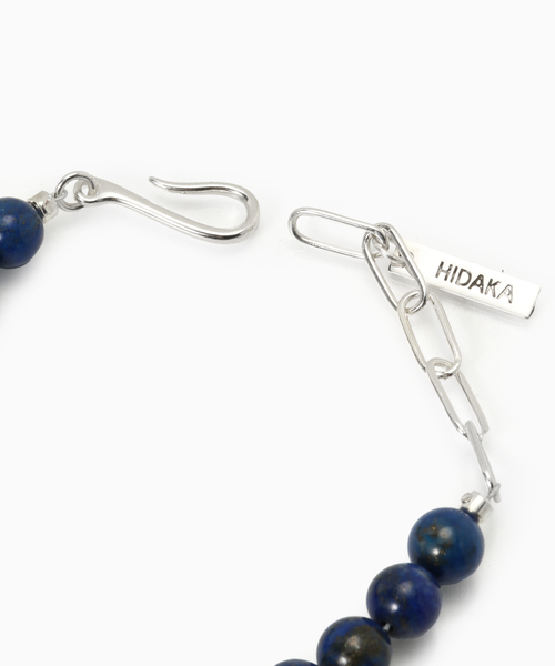 HIDAKA(ヒダカ)の「HIDAKA / ヒダカ ORBIT WATCH BRACELET LAPIS(ブレスレット・メンズ・ネイビー・FREE)」の3枚目の写真