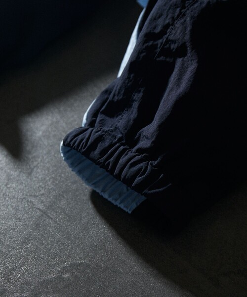 UMBRO（アンブロ）の「UMBRO/アンブロ 別注 Nylon Jacket/ナイロンジャケット（ブルゾン・メンズ・ブラック/ネイビー・MEDIUM/LARGE/X-LARGE）」の12枚目の写真