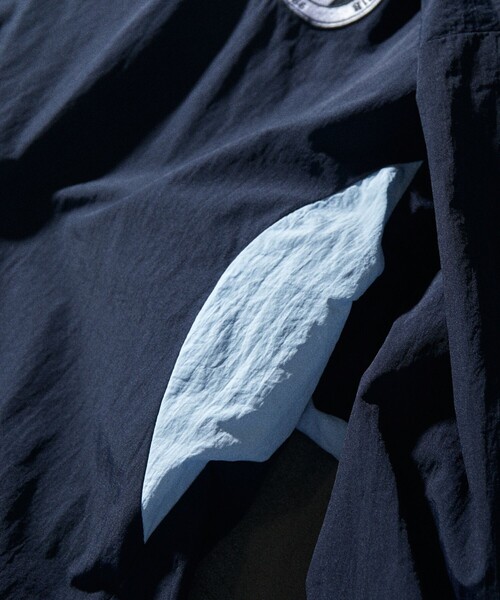 UMBRO（アンブロ）の「UMBRO/アンブロ 別注 Nylon Jacket/ナイロンジャケット（ブルゾン・メンズ・ブラック/ネイビー・MEDIUM/LARGE/X-LARGE）」の7枚目の写真