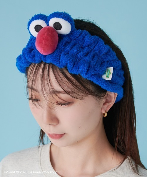 SESAME STREET(セサミストリート)の「フェイスモチーフヘアバンド(ヘアバンド・レディース・グリーン/ダークブルー・F)」の1枚目の写真